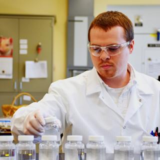 Testing a water sample for bacterial contamination in the Missouri State Public Health Laboratory.