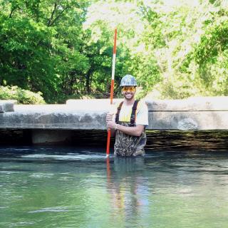 MoDOT’s Austin Hibler inspects a bridge on County Road No. 130 in Jasper County.