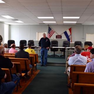 Governor Parson visits with residents of Canton, MO to discuss flood recovery 